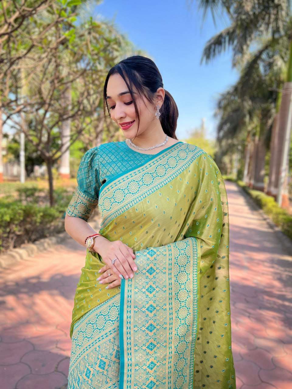 Tissue Saree with Intricate Zari Woven Motifs